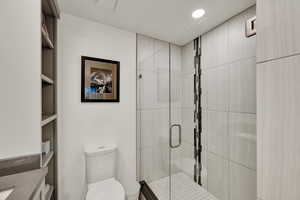 Owner's suite featuring large double vanity, shower.