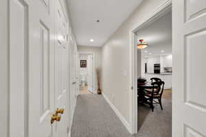 Owner's suite hallway leading to bathroom.