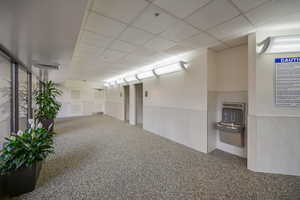 Hallway area leading to indoor pool and saunas,