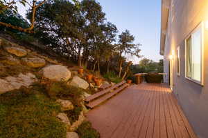 View of deck at dusk