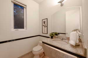 Bathroom featuring toilet and vanity