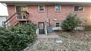 Back of property with central AC unit