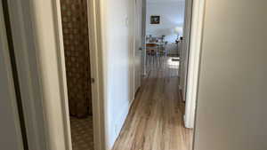 Hallway featuring light hardwood / wood-style floors