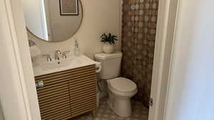 Bathroom with vanity and toilet