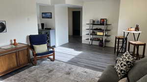 Living area featuring dark hardwood / wood-style flooring