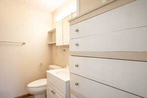 Bathroom with vanity and toilet