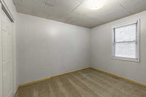 Empty room with light carpet