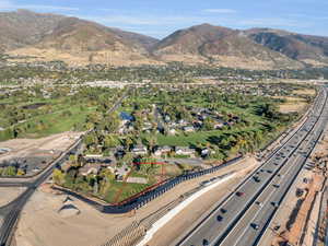 Birds eye view of property featuring a mountain view