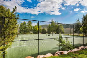 View of sport court with a mountain view