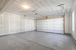 Garage featuring an epoxy flooring upgrade