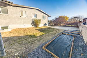 View of side of property with a patio area