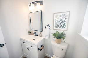 Bathroom with vanity and toilet