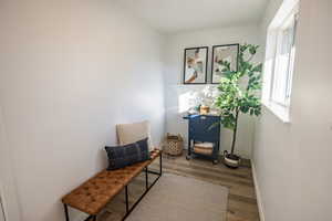 Sitting room featuring hardwood / wood-style flooring