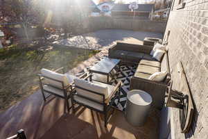 View of patio featuring an outdoor hangout area