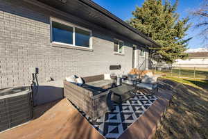 View of patio featuring central AC and an outdoor hangout area