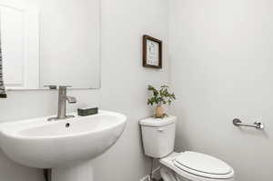 Bathroom with sink and toilet