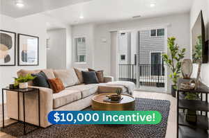 Living room with hardwood / wood-style flooring