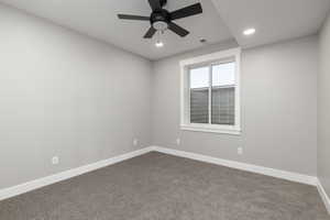 Bedroom featuring ceiling fan, closet, and carpet floors