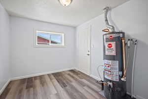 Utility room with gas water heater