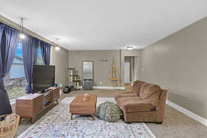 Living room featuring carpet flooring