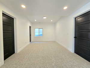 Downstairs living area attached to family room flex space