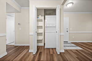 Closet featuring stacked washer / dryer