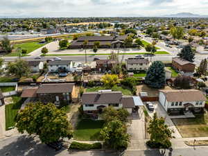 The beautiful trees add lovely ambiance to this neighborhood, which is walkable to many necessities.