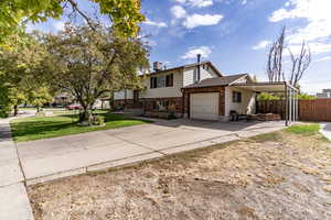 With plenty of parking, this one car garage and carport with long driveway allows for RV parking, truck, trailer with plenty of off-street room for guests or family members.