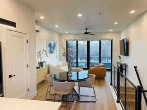 Dining room featuring ceiling fan and light hardwood / wood-style floors