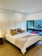 Bedroom featuring hardwood / wood-style flooring