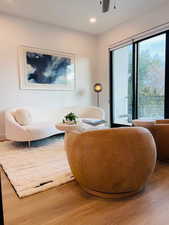 Sitting room featuring hardwood / wood-style floors