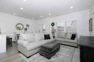 Living room featuring light wood-type flooring