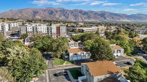 Birds eye view of property with a mountain view