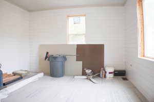 Interior space with a wealth of natural light and tile patterned flooring