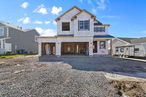 View of front of house with a patio