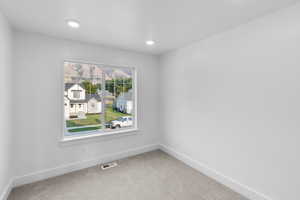 *Photo is of a previously built home of the same layout* View of carpeted bedroom