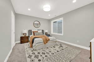 View of carpeted bedroom