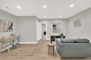 Living room featuring light wood-type flooring