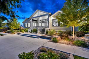 Rear view of property with a porch