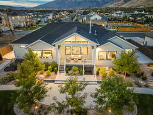 Back of property featuring a mountain view