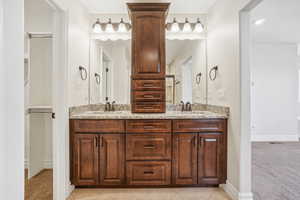 Tons of storage with UPGRADED vanity cabinetry.  Have clean countertops all the time