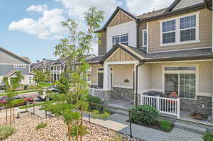 Craftsman-style home featuring covered porch