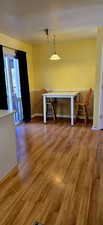 Dining space featuring hardwood / wood-style flooring