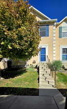 View of front of house featuring a front lawn