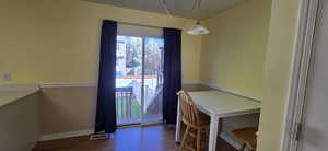 Dining space featuring dark hardwood / wood-style flooring