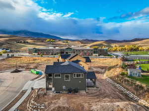 Drone / aerial view featuring a mountain view