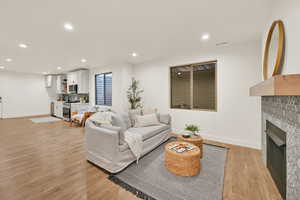 ADU Living room with light hardwood / wood-style flooring