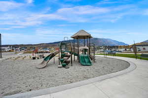 View of play area with a mountain view