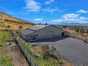 Shop, caretaker apartment, and horse stalls