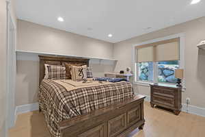 Bedroom featuring light hardwood / wood-style flooring